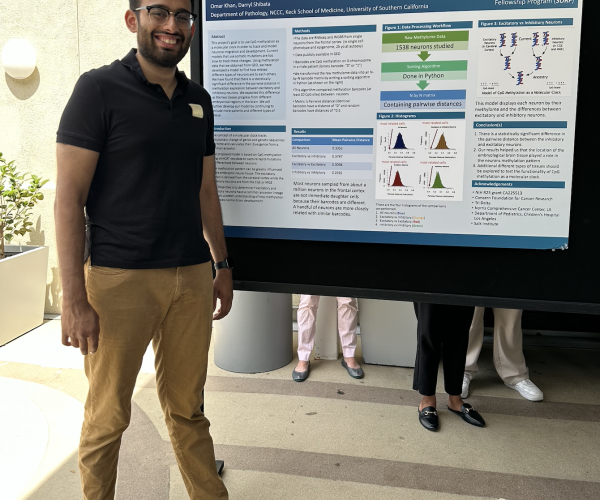 Student in front of USC/CHLA Summer Oncology Research Fellowship Program Program